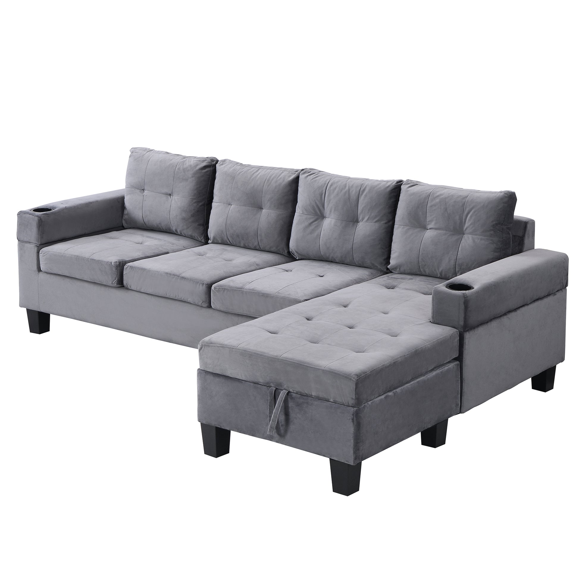 Gray velvet sectional sofa with tufted cushions and builtin cup holders