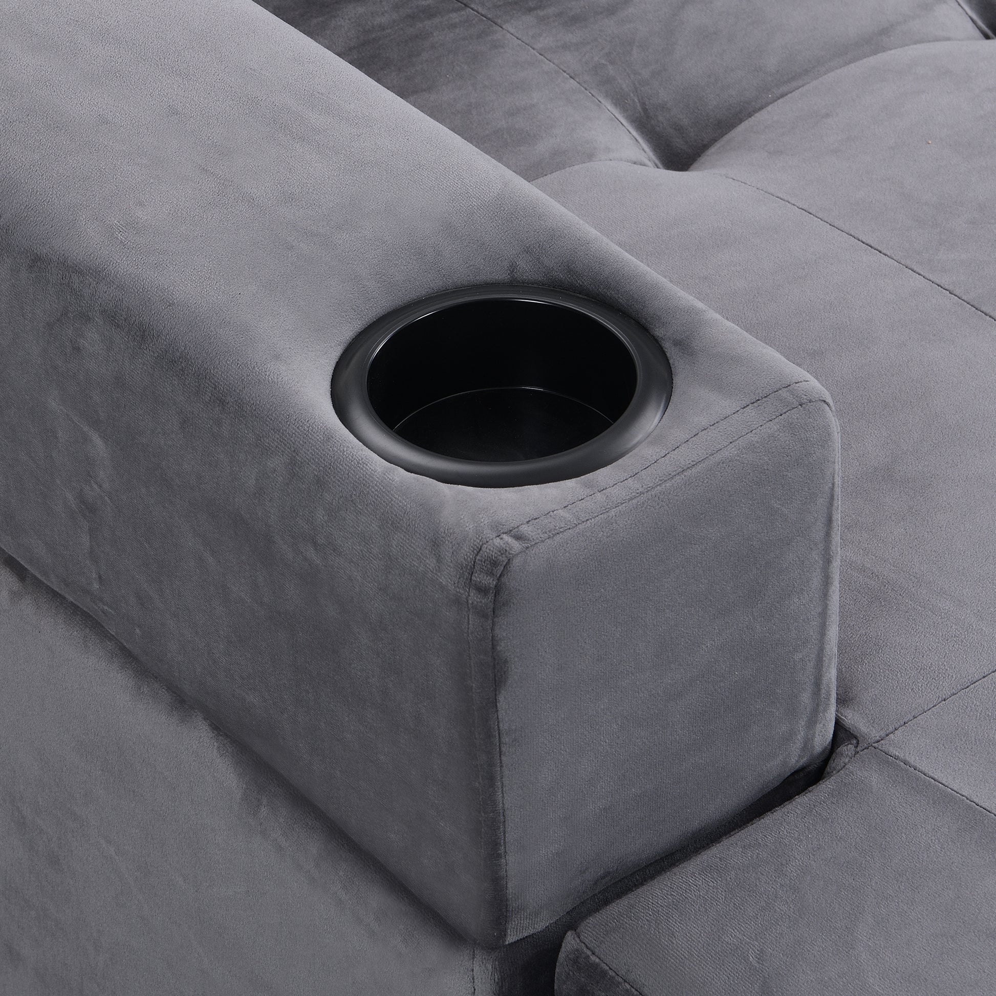 Gray velvet armchair with integrated cup holder