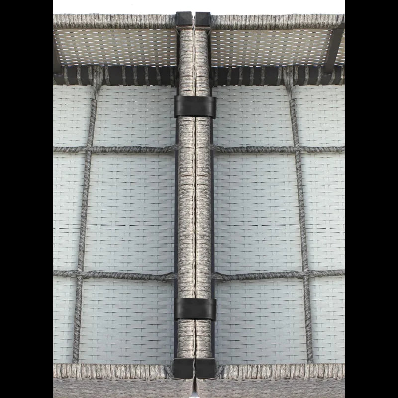 Closeup of gray rattan weave texture on outdoor furniture