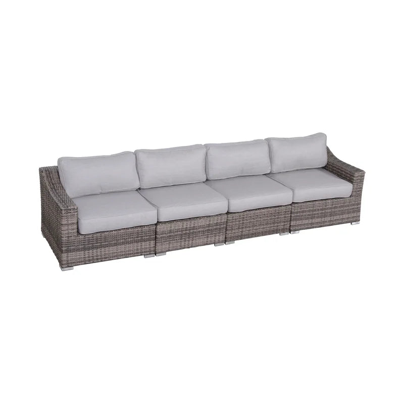 Gray wicker sectional outdoor sofa with light gray cushions
