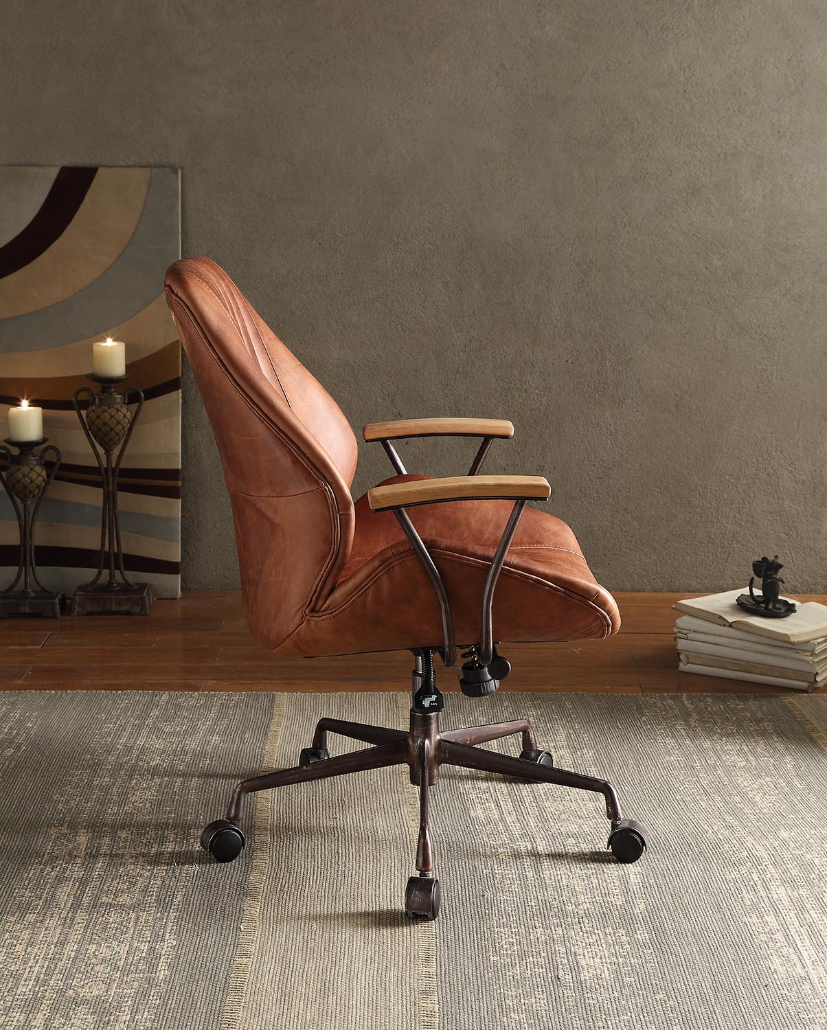 Brown leather executive chair with wood armrests and metal base