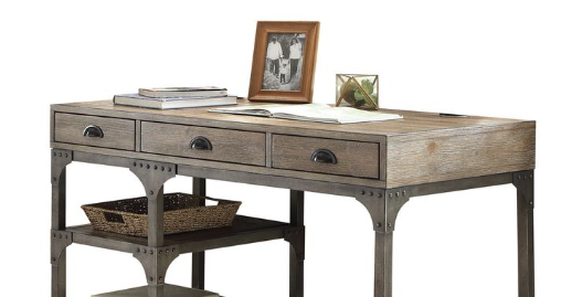 Industrial style writing desk with weathered wood finish and metal frame