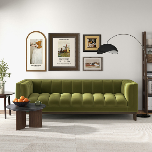 Green velvet channeltufted sofa
