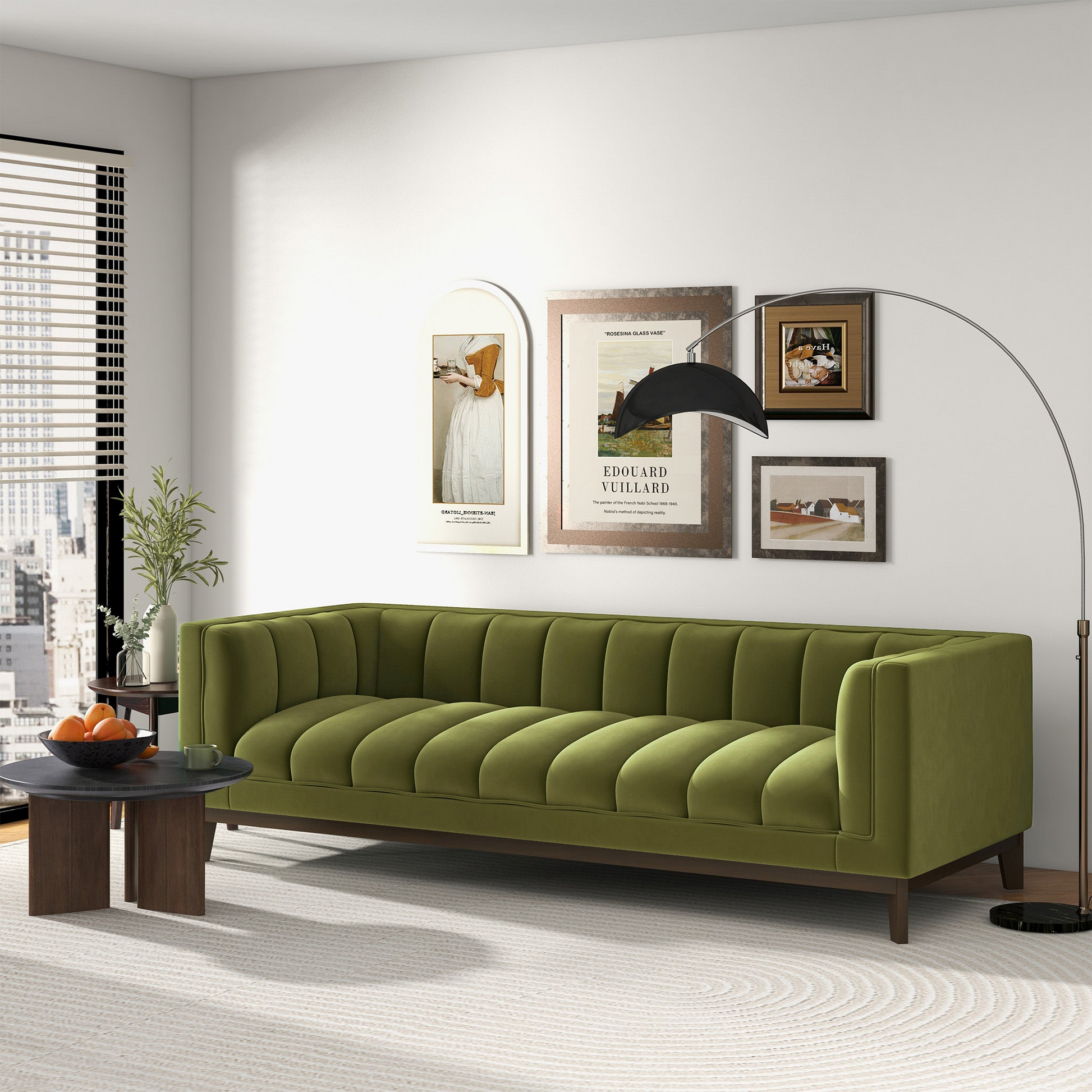 Green velvet channel tufted sofa with dark wood legs