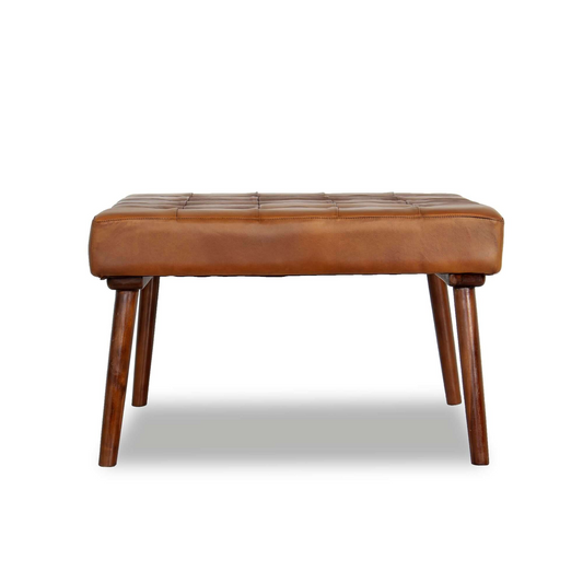 Tufted brown leather ottoman with tapered wooden legs