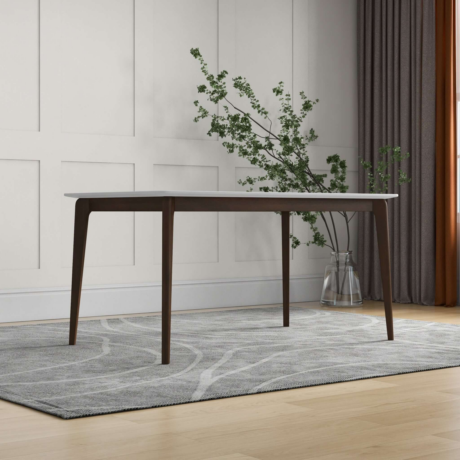 Modern dining table with white marble top and dark wood tapered legs