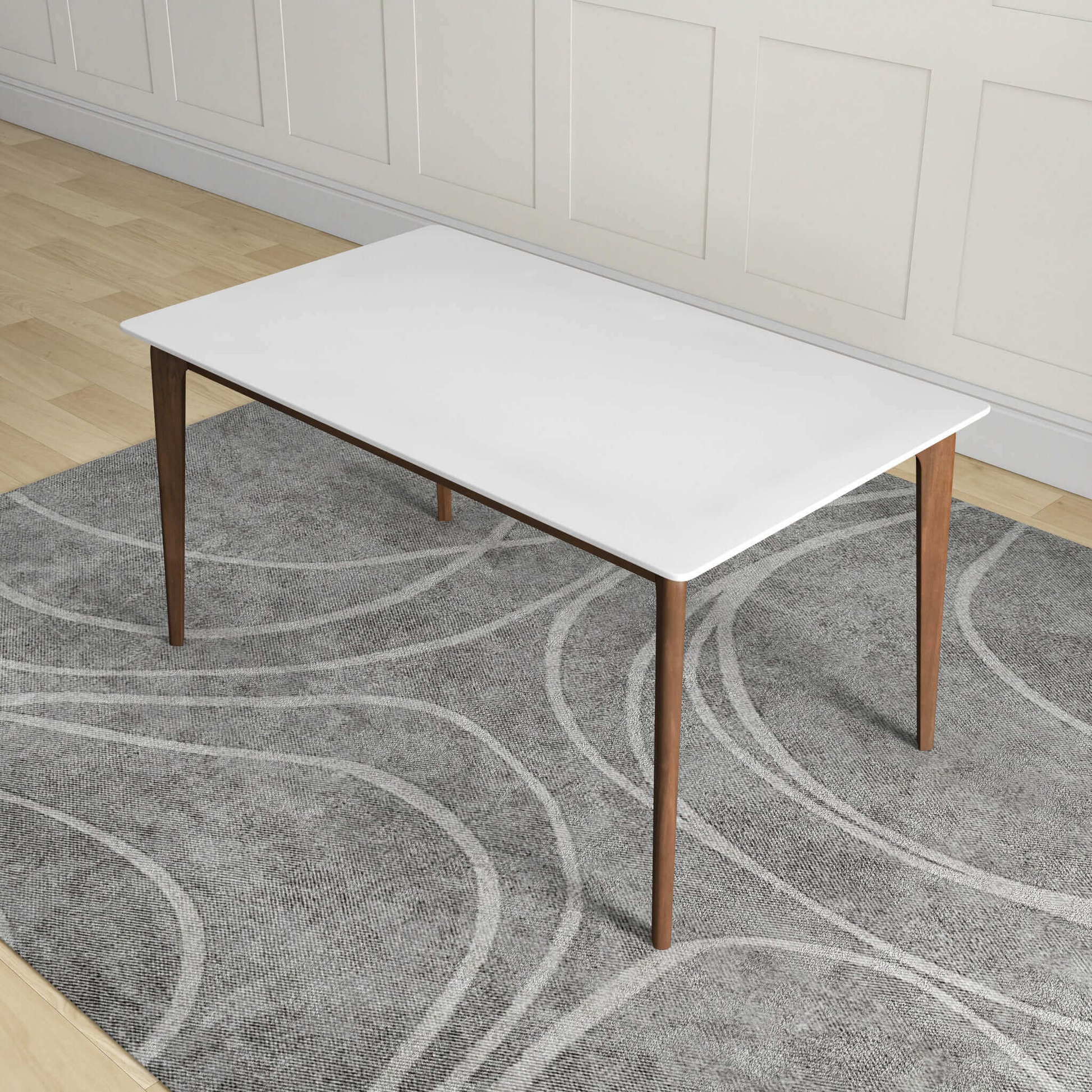 Minimalist white dining table with sleek wooden legs