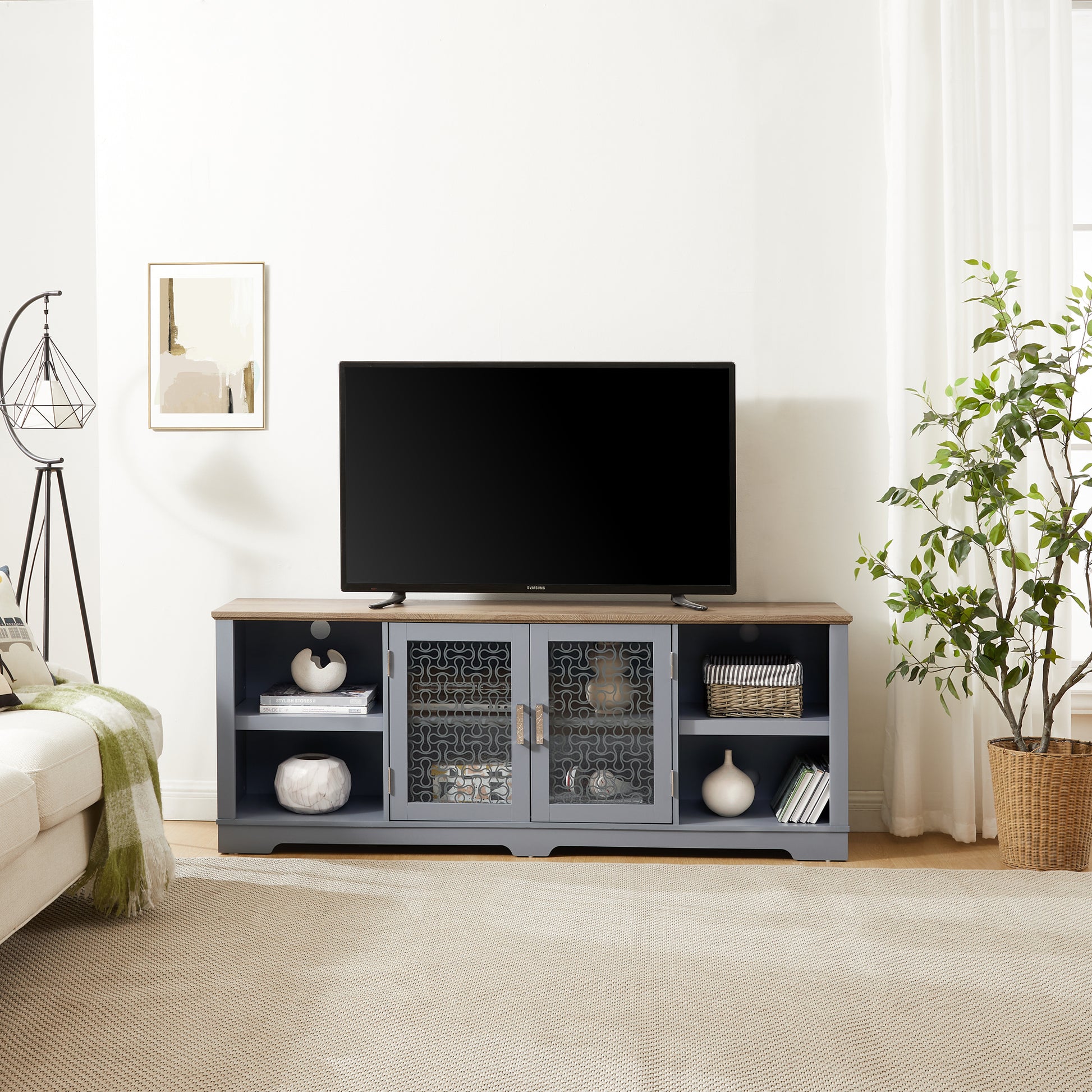 Gray media console with wooden top and two glass doors