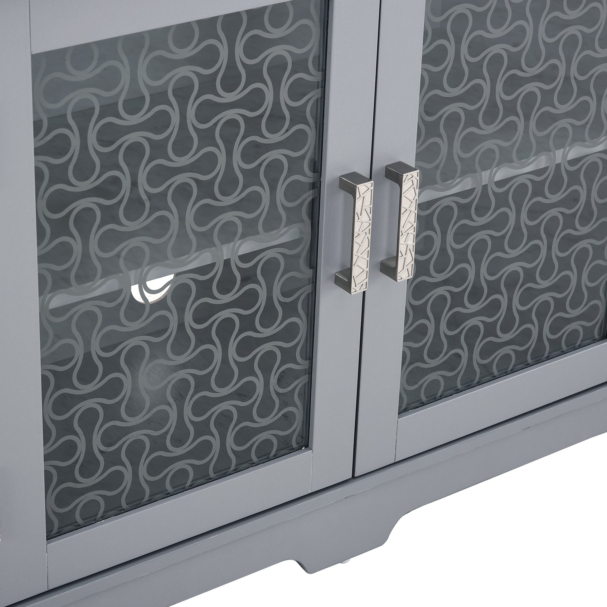 Gray cabinet with decorative patterned glass doors and modern silver handles