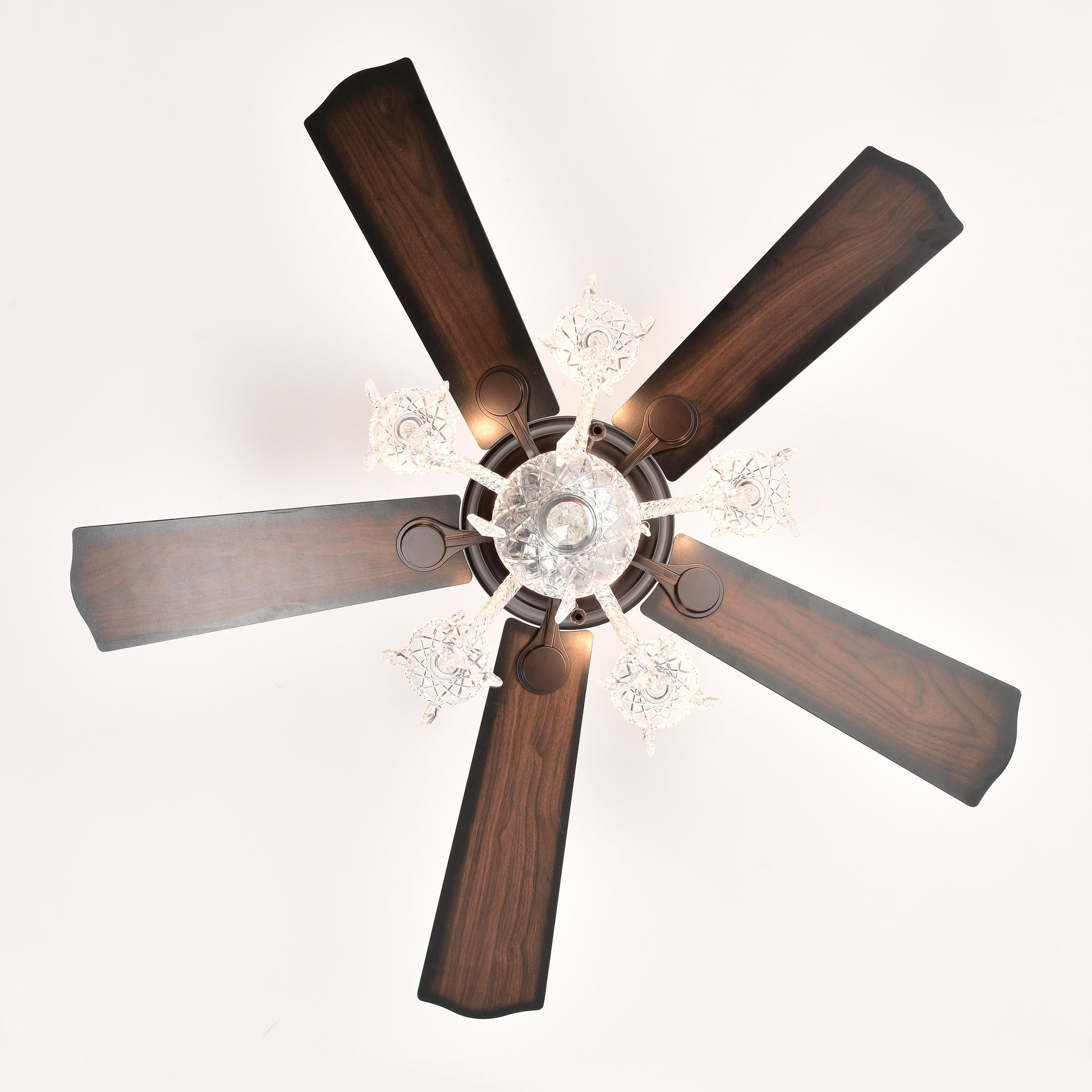 Elegant brushed nickel ceiling fan with dark wood blades and crystal accents