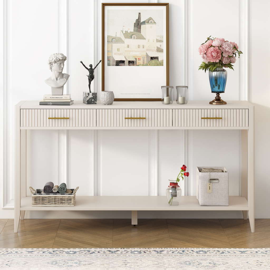 Cream fluted console table with gold handles and decorative items