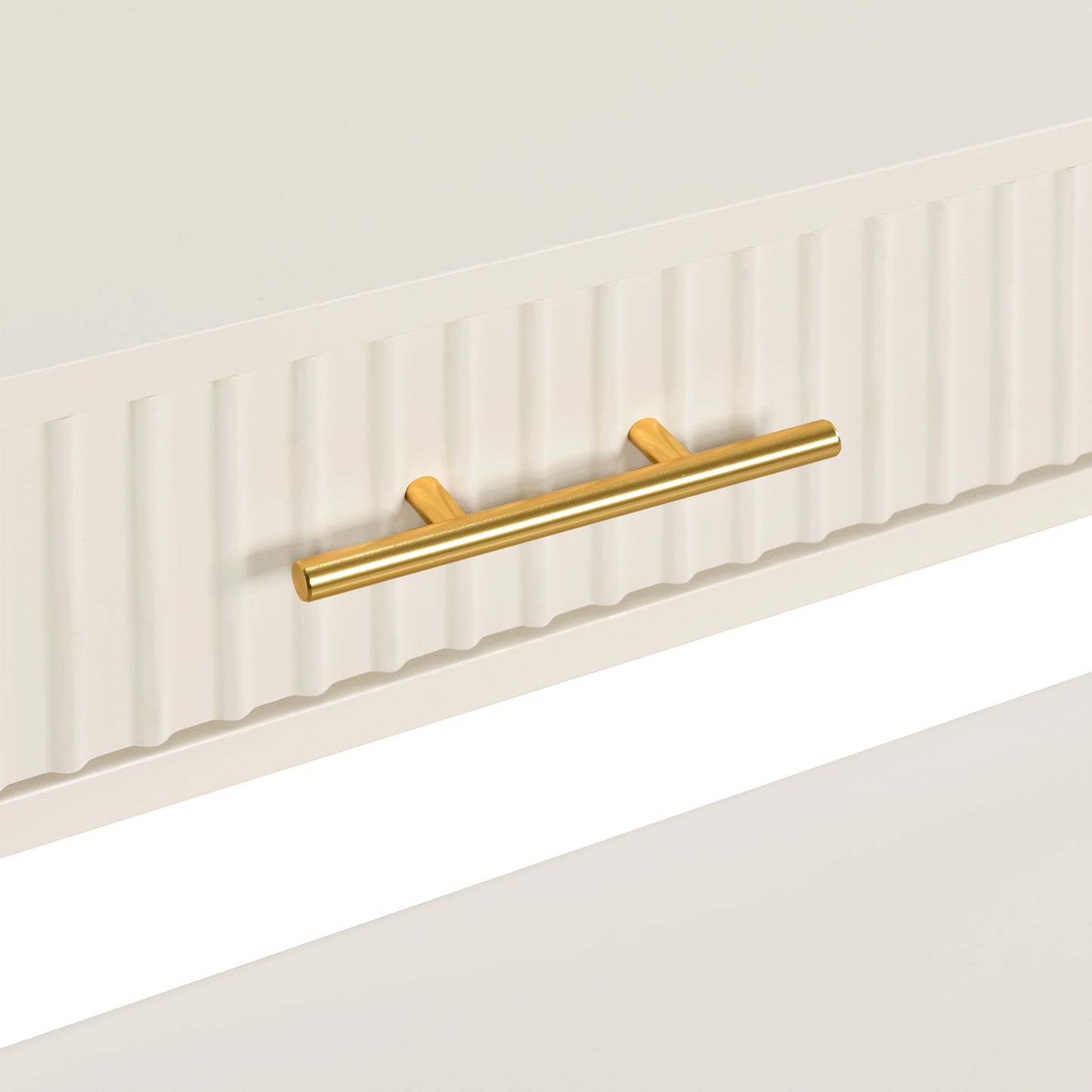 Cream textured drawer with polished brass bar pull