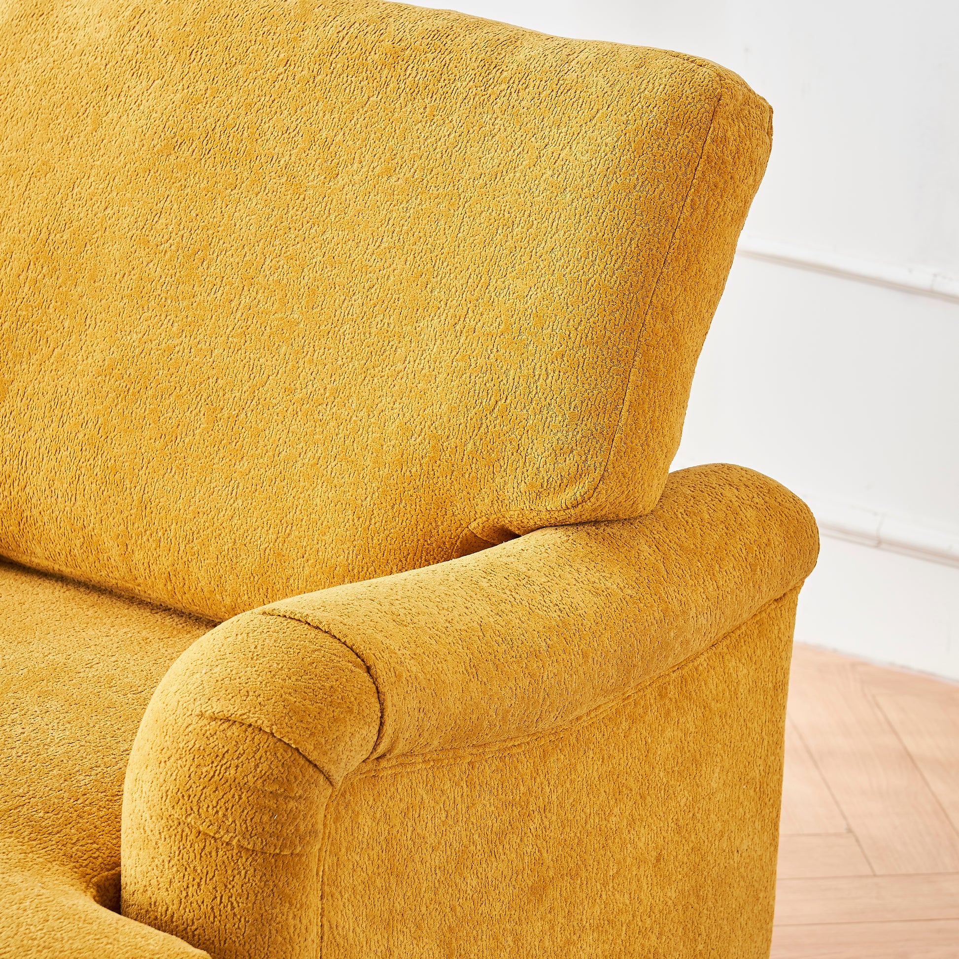 Plush mustard yellow armchair fabric with textured details