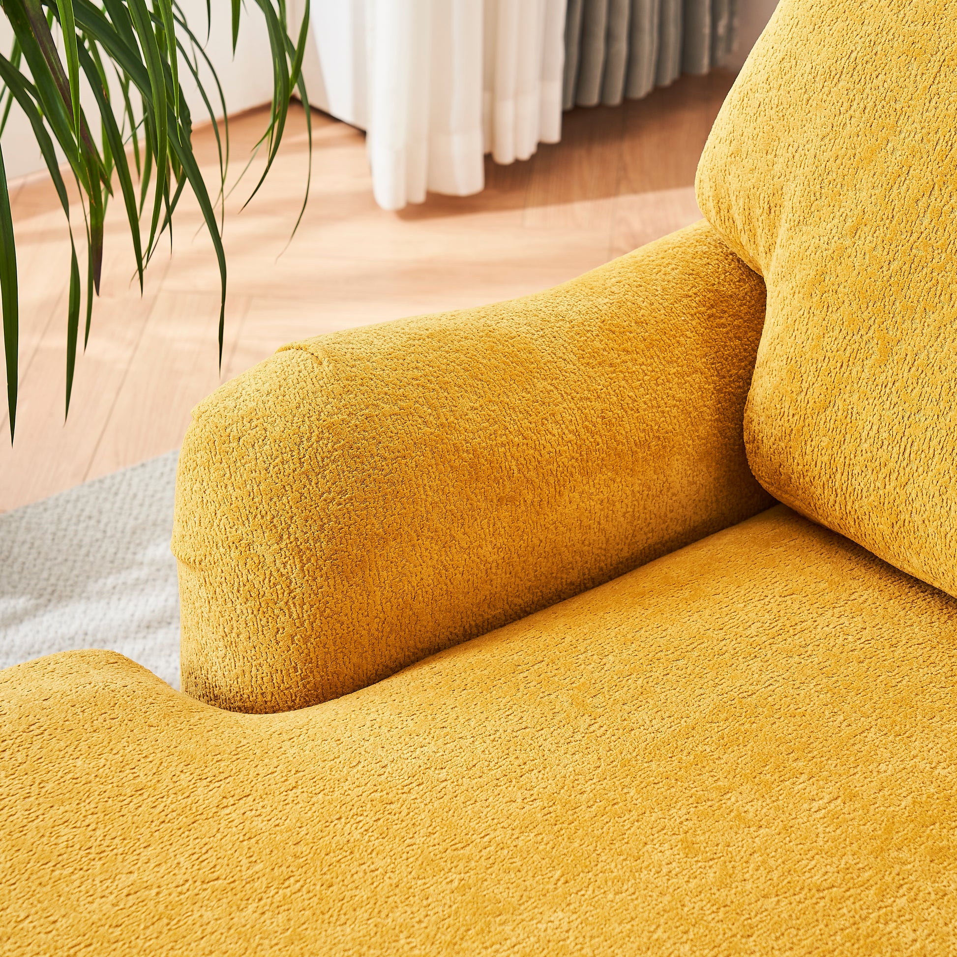 Yellow textured sofa armrest detail