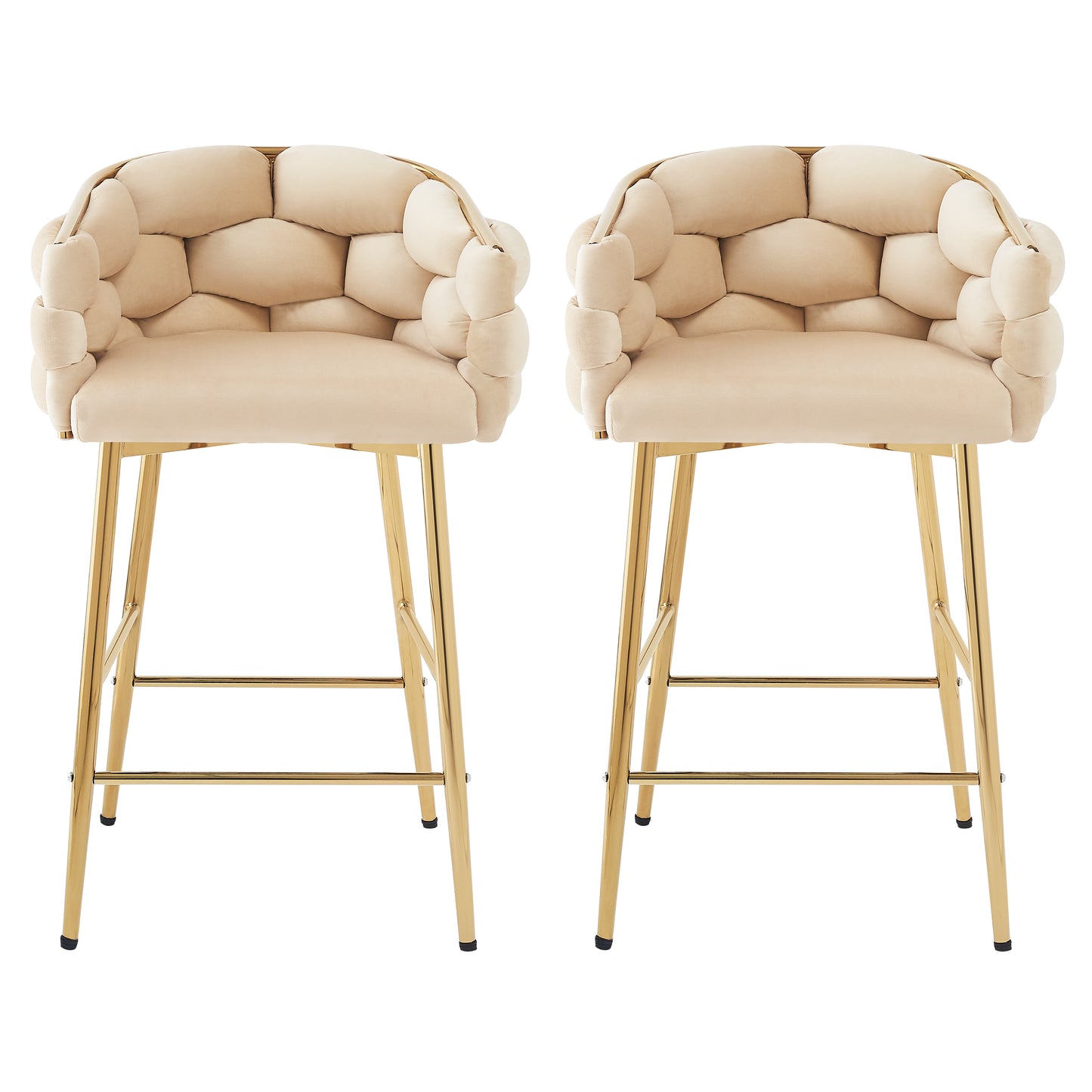 Two plush champagne velvet bar stools with gold metal legs featuring a buttontufted design for a modern living space