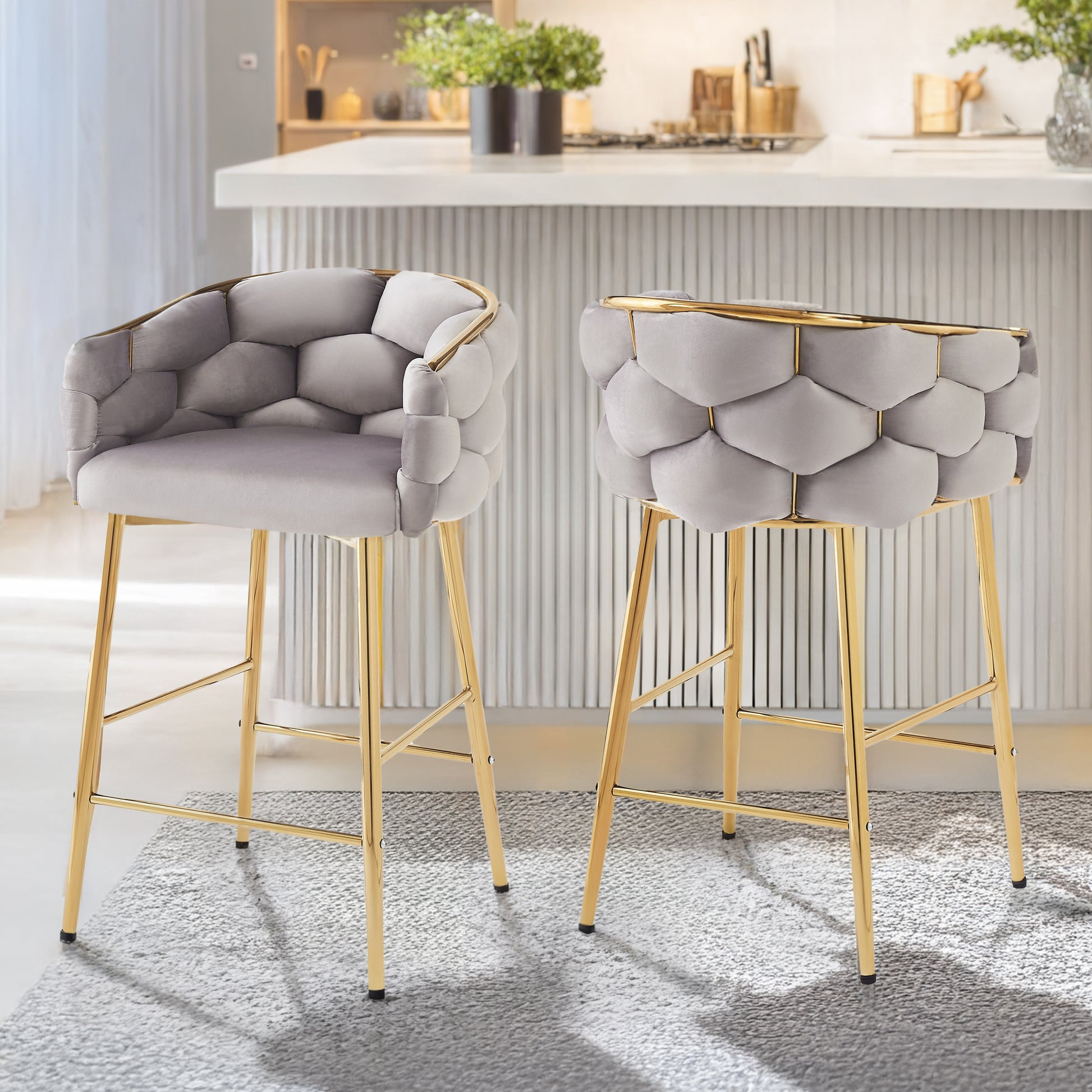 Grey velvet bar stool with diamond tufting and gold legs