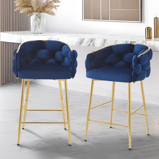 Navy velvet bar stool with tufted bubble design and gold frame