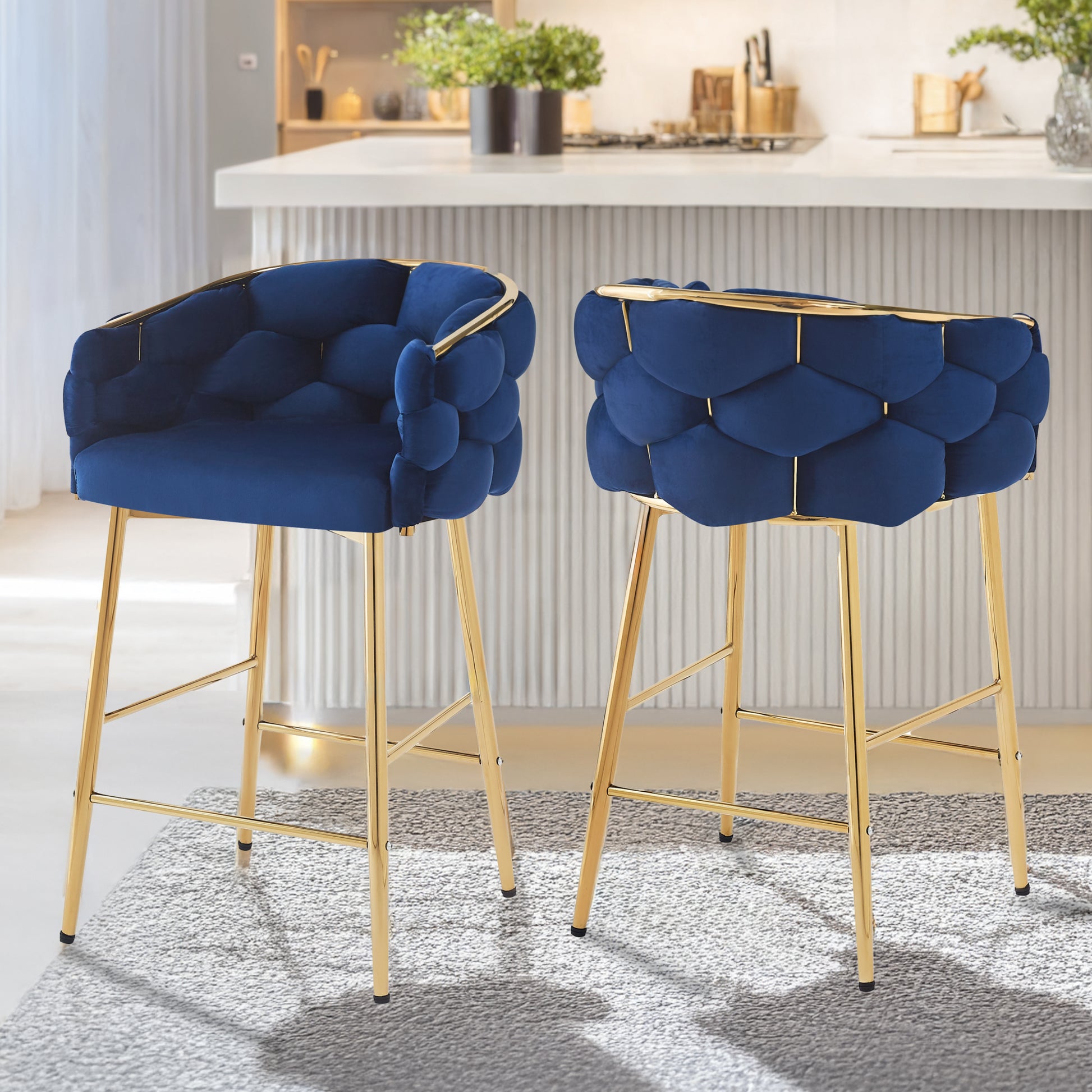 Navy velvet bar stool with gold frame and tufted detailing