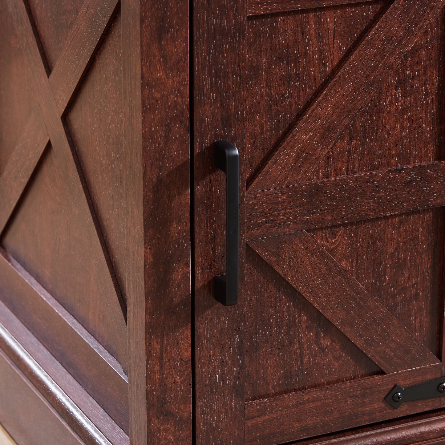 Dark wood barn door cabinet with black handle