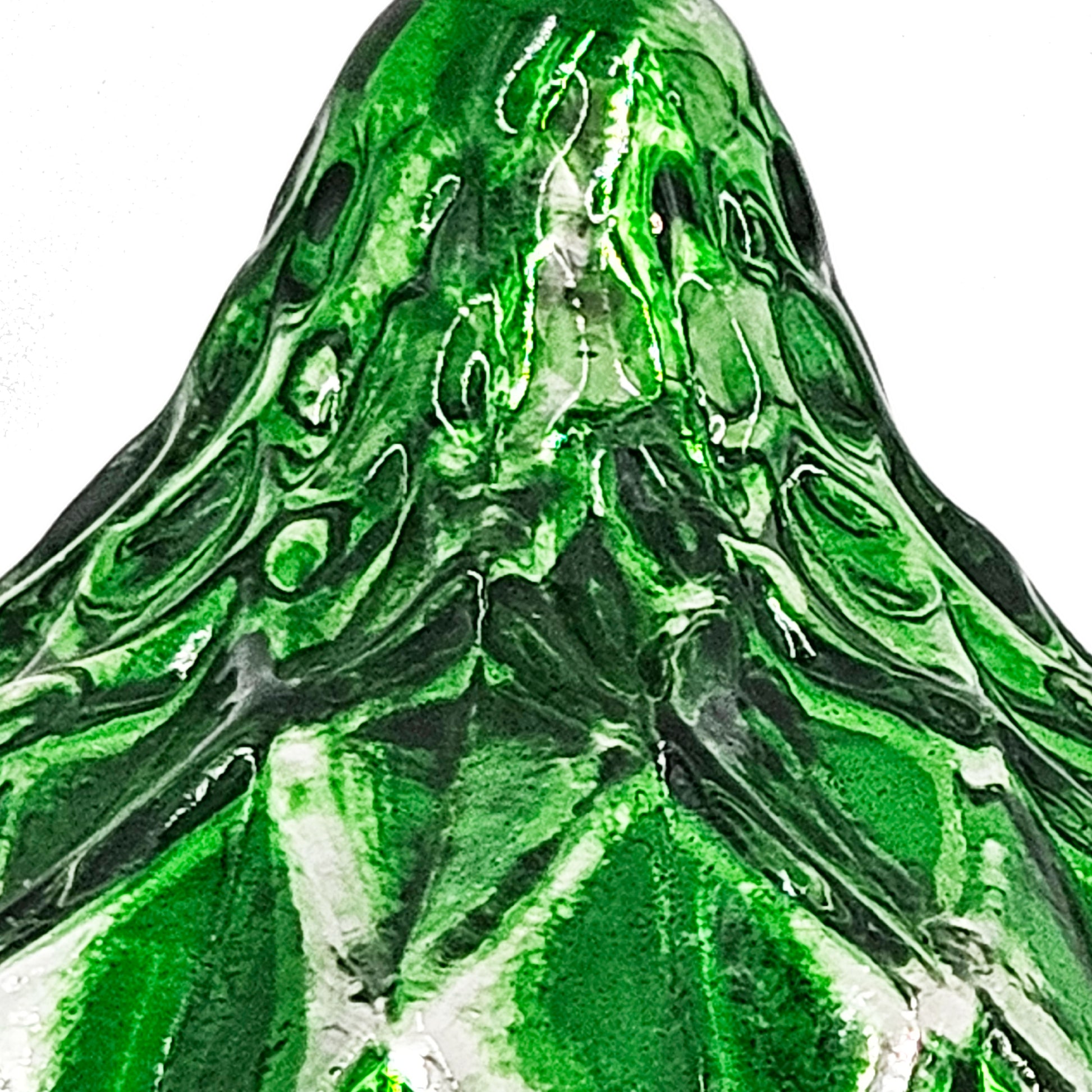 Textured emerald green glass sculpture with swirling patterns