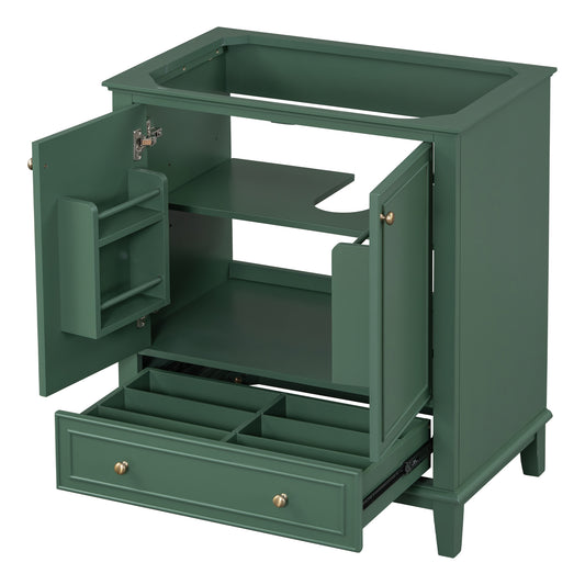 Green bathroom vanity cabinet with open doors and drawer