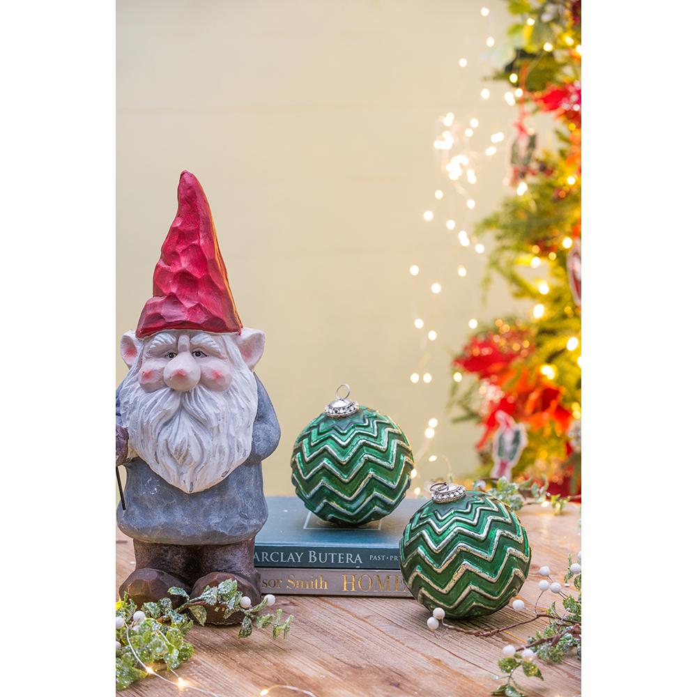 Garden gnome figurine with red hat and white beard