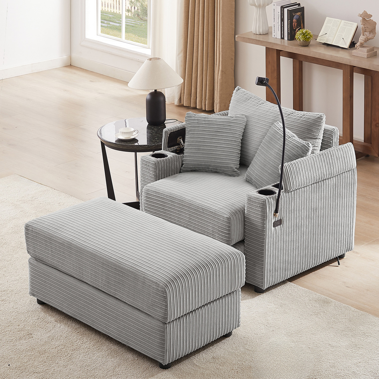 Gray corduroy armchair with matching ottoman and cup holders