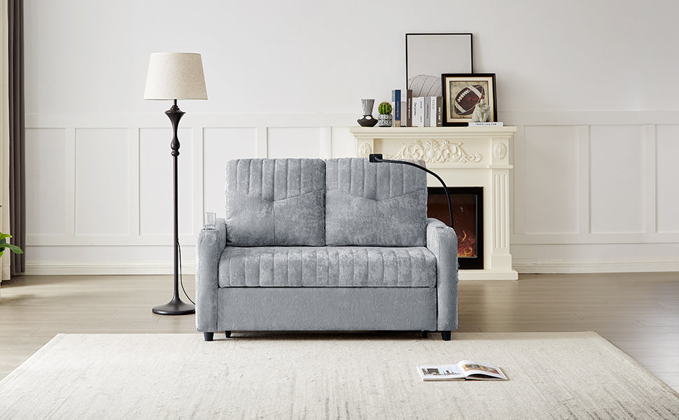 Gray velvet loveseat sofa with tufted back cushions and builtin cup holders