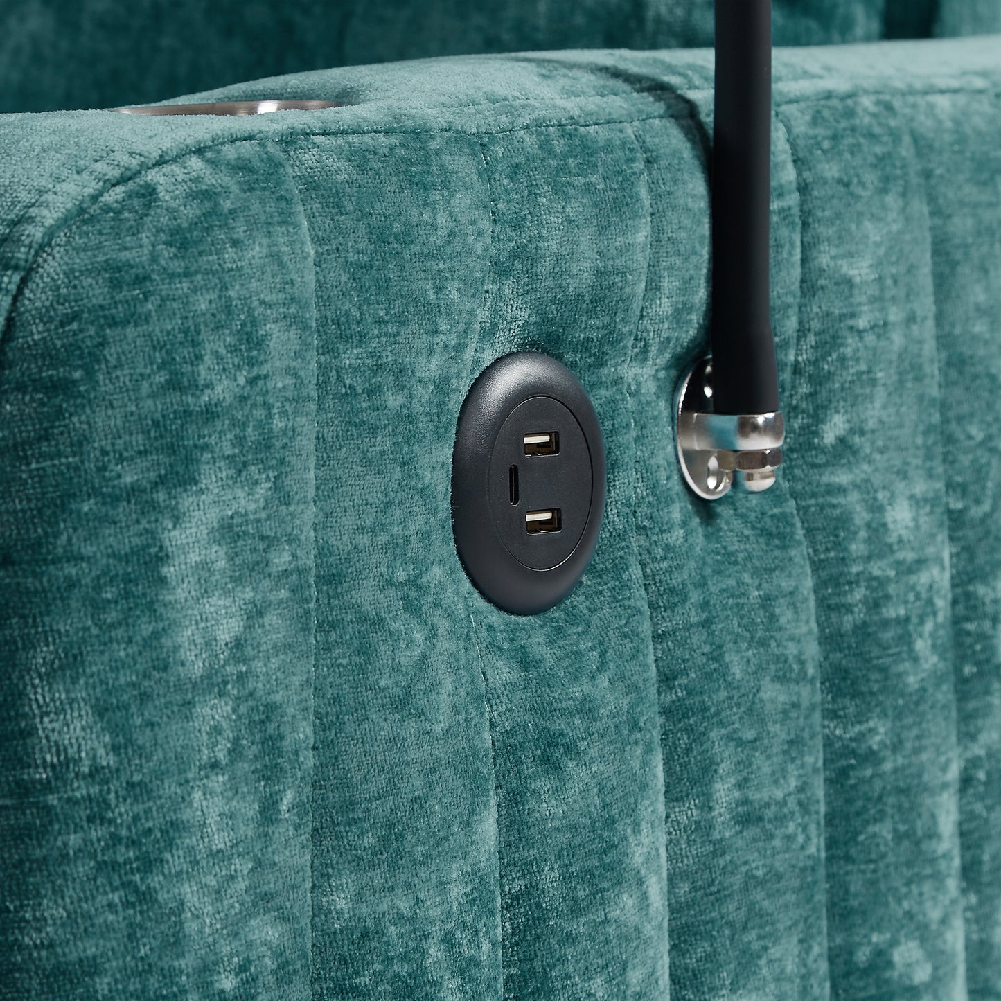 Teal velvet tufted sofa with integrated USB charging port