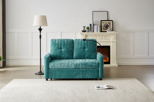 Teal velvet futon sofa with tufted cushions and integrated cup holders
