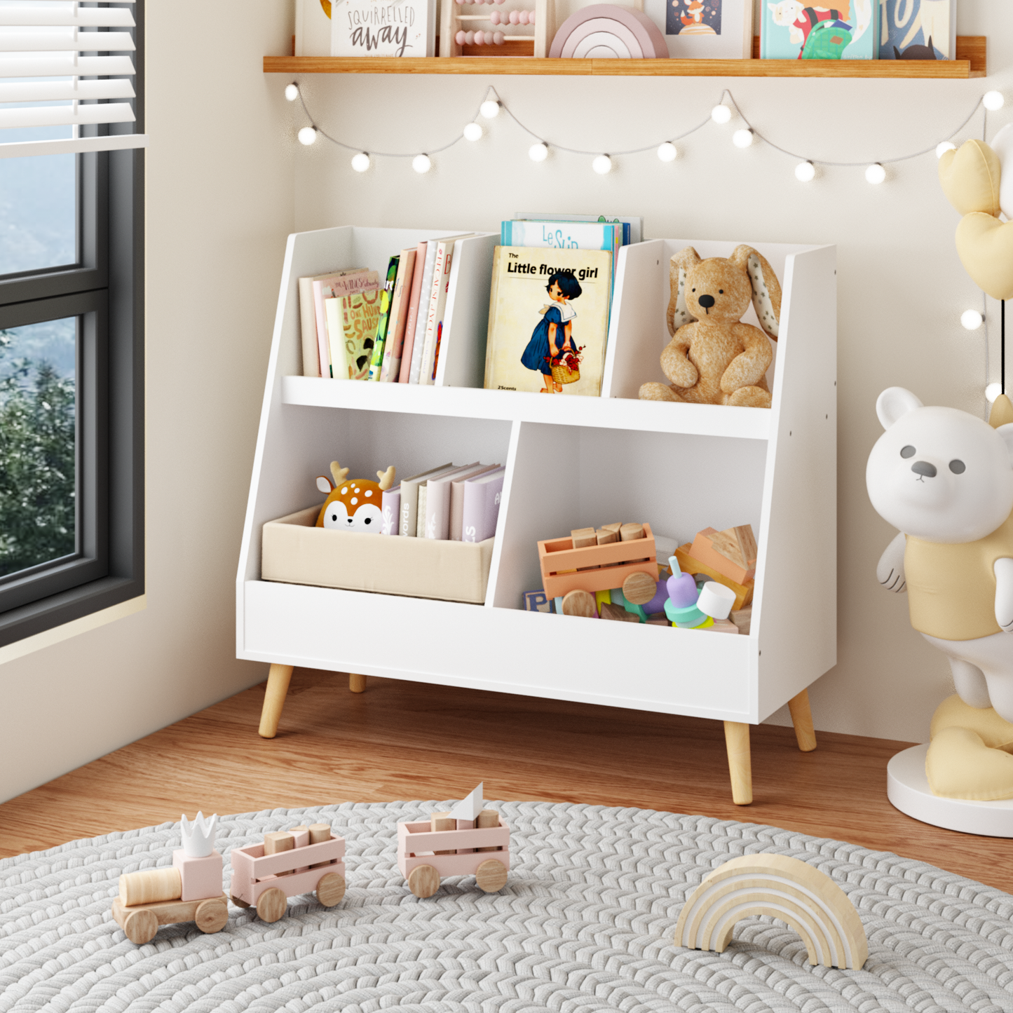 White wooden kids bookshelf with stacked books and plush toys