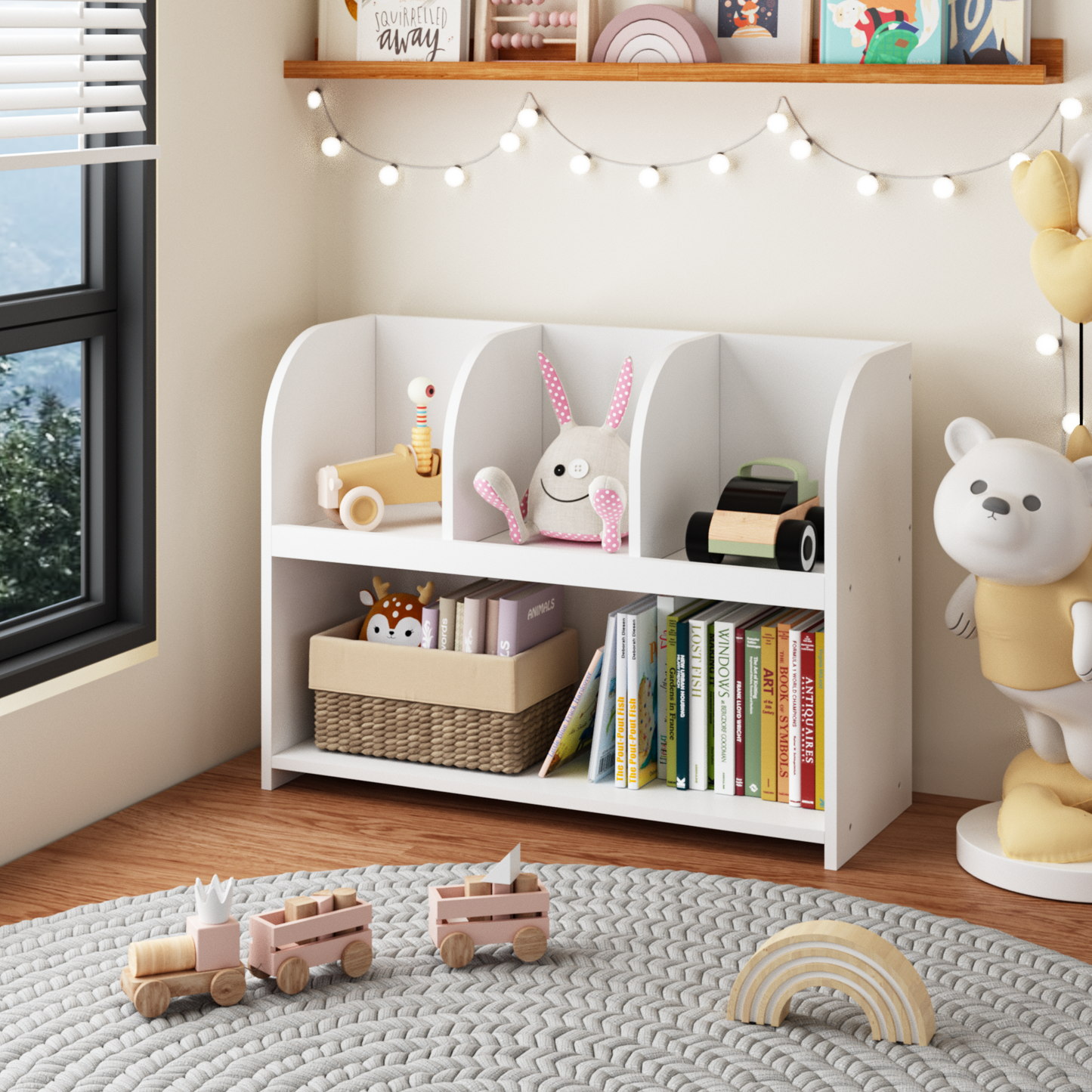 White wooden toy bookshelf filled with stuffed animals and books