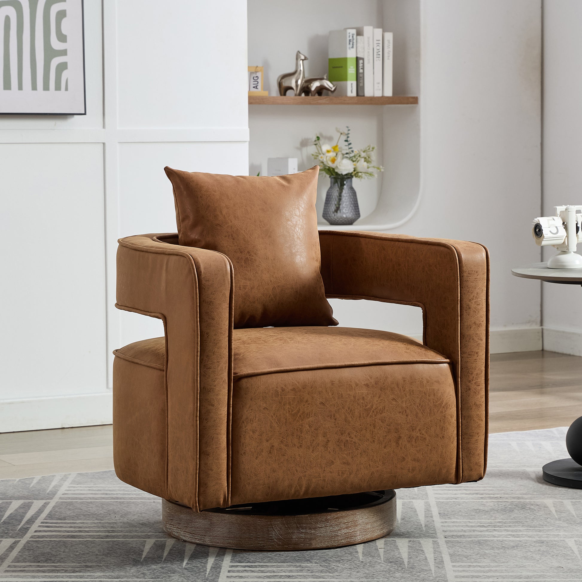 Tan faux leather swivel accent chair with square arms and removable cushion