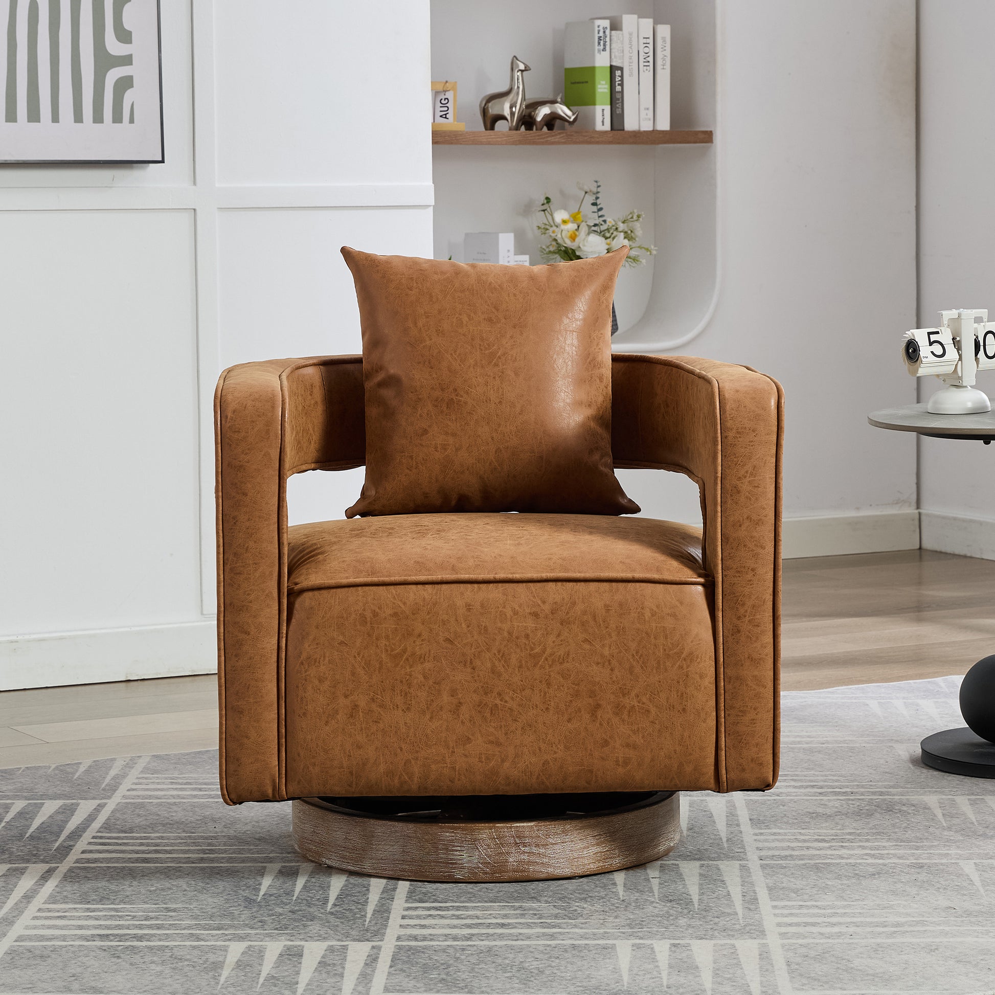 Tan faux leather swivel armchair with wood base