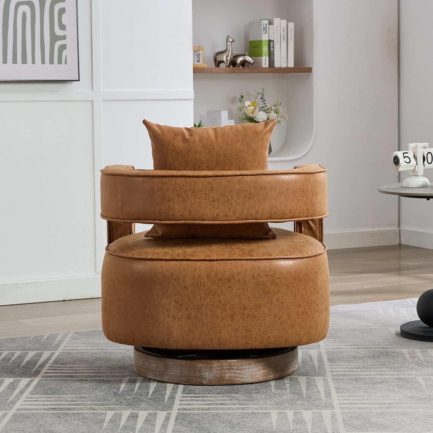 Tan leather accent chair with swivel base