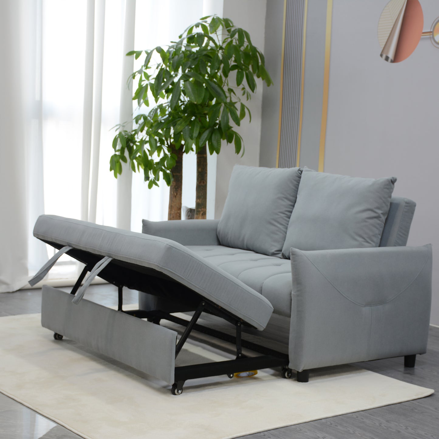 Grey fabric sofa bed with storage compartment