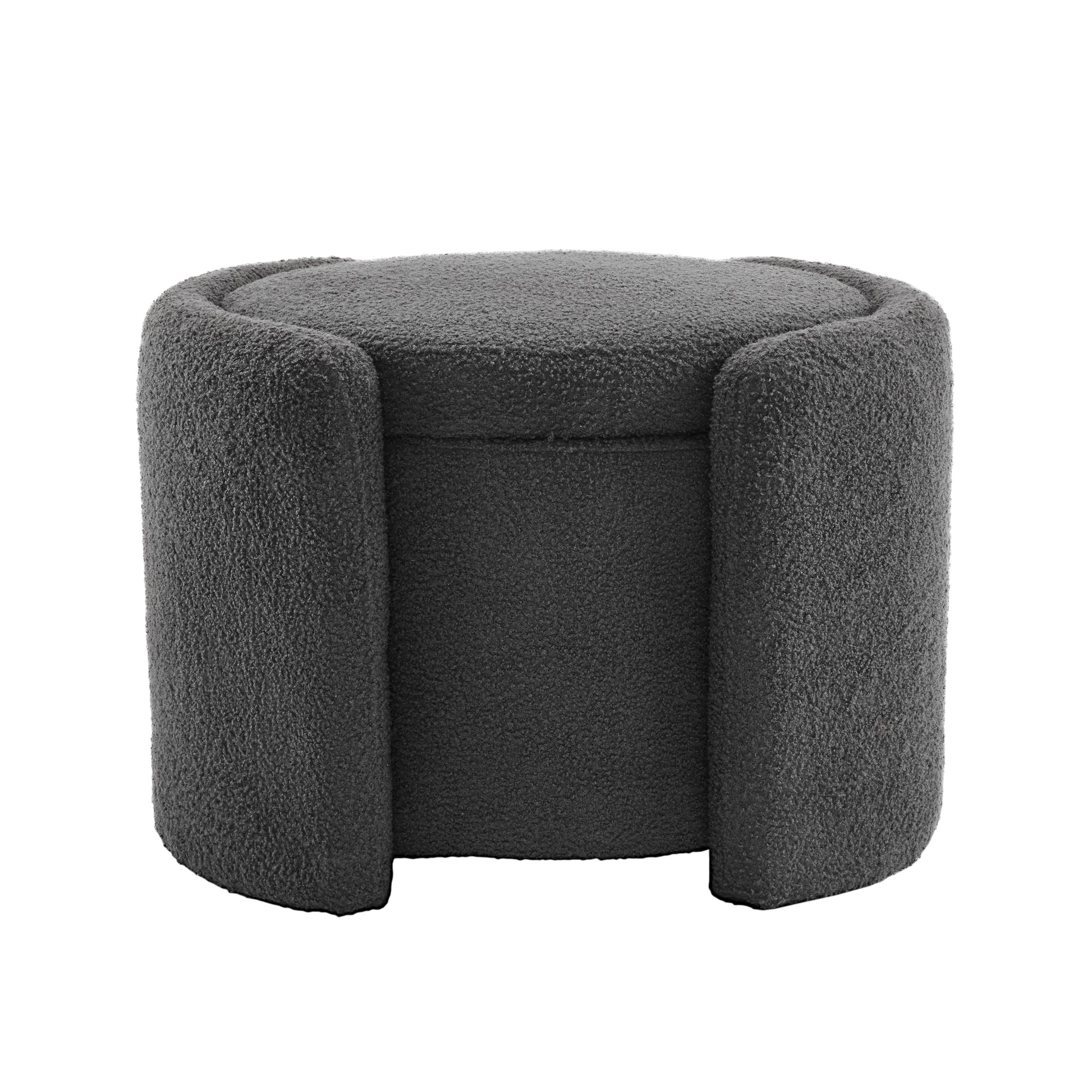 Dark gray textured boucle fabric ottoman with a rounded top and Ushaped base