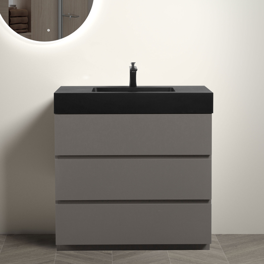 Modern grey vanity with black countertop and integrated sink
