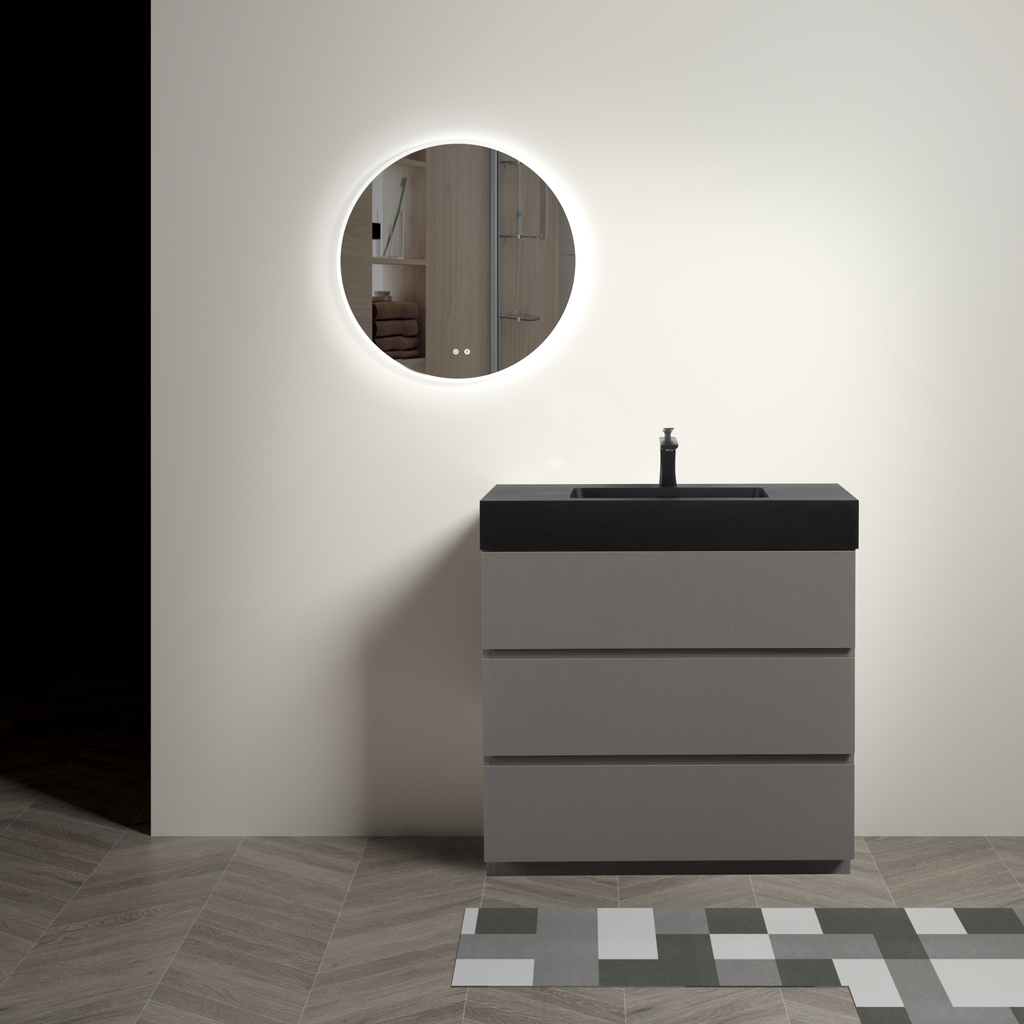 Modern grey bathroom vanity with three drawers and a black countertop