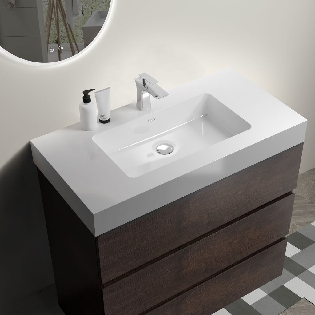 Modern dark wood bathroom vanity with white integrated sink and chrome faucet