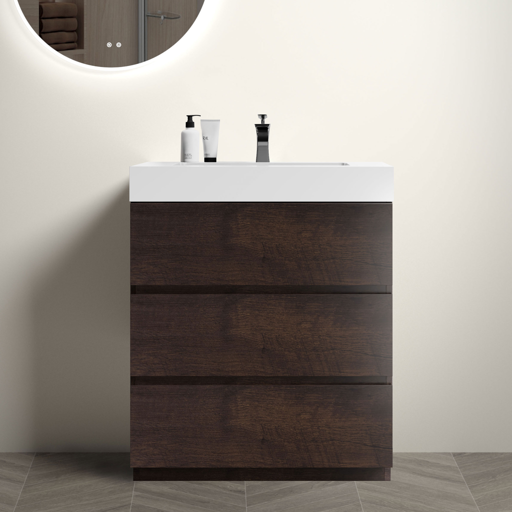 Dark wood bathroom vanity with white integrated sink and chrome faucet