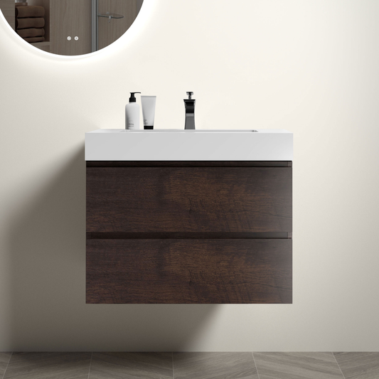 Dark wood bathroom vanity with white countertop and modern faucet