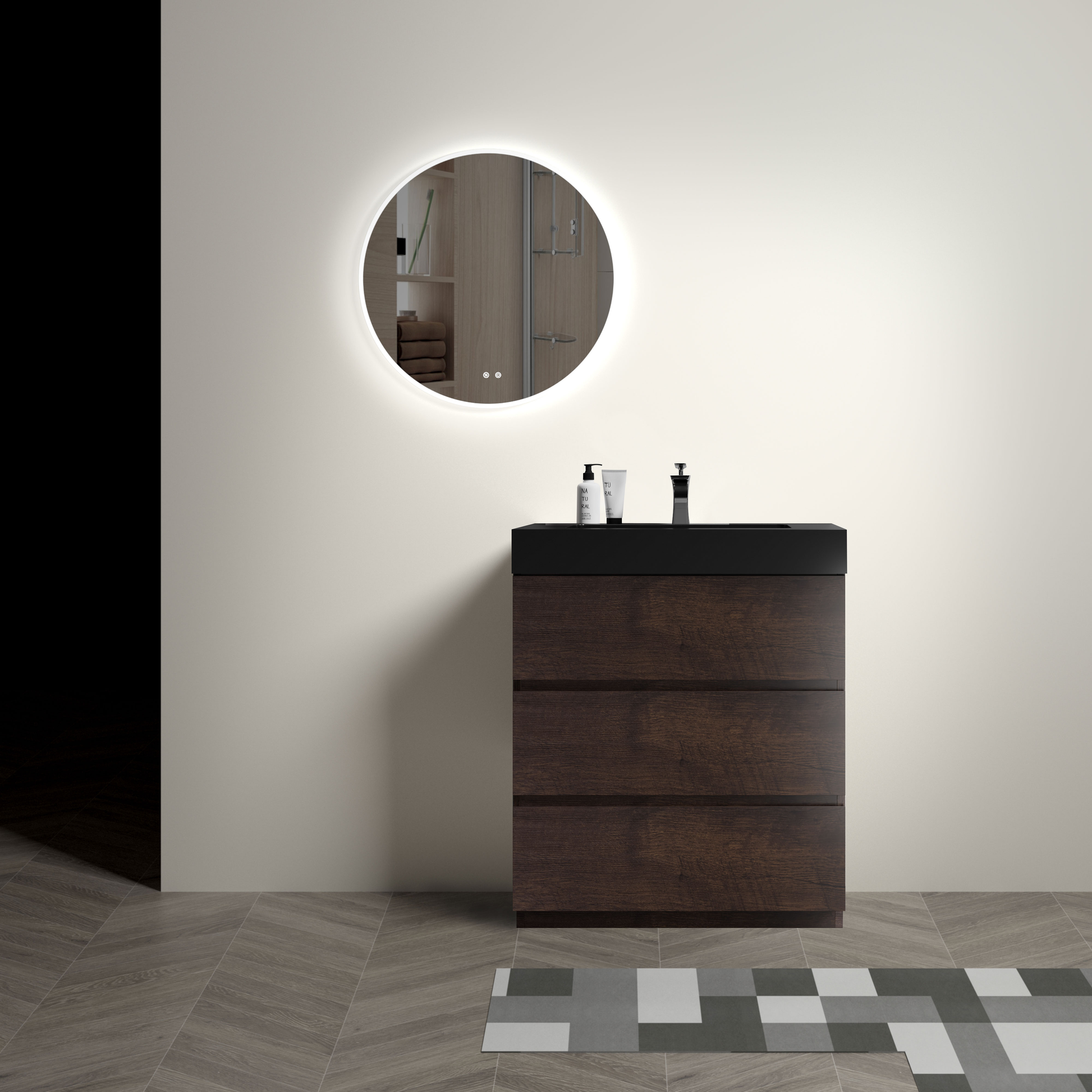 Dark wood bathroom vanity with black countertop and integrated sink