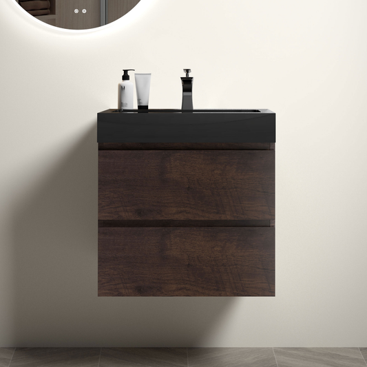 Floating bathroom vanity with dark wood grain drawers and black countertop