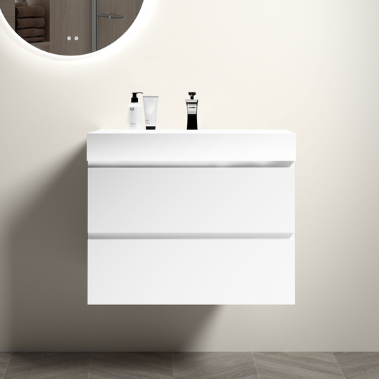Floating white bathroom vanity with two drawers and sleek chrome faucet