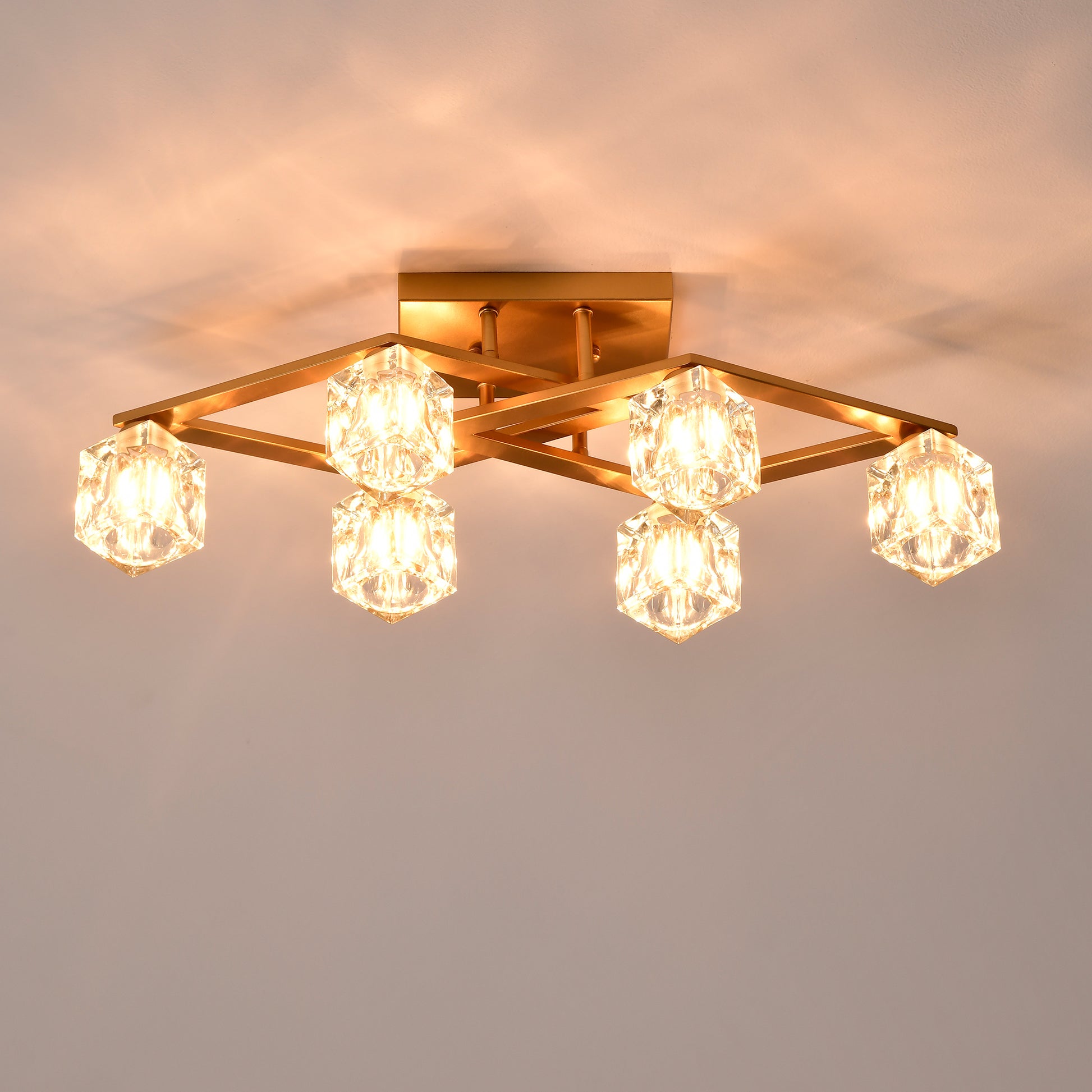 Modern gold flush mount light with crystal cube shades