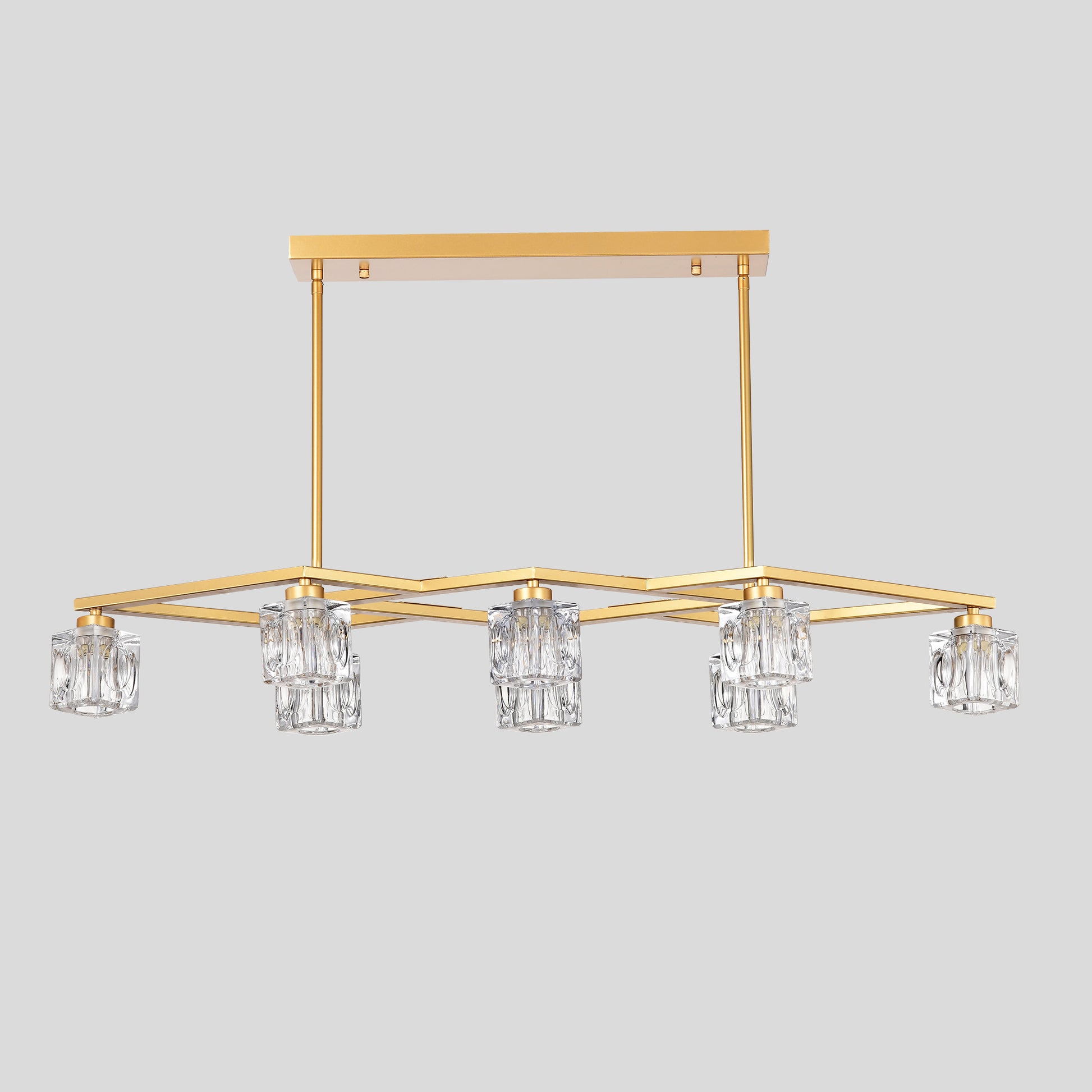 Gold linear chandelier with clear glass prism shades and modern geometric design