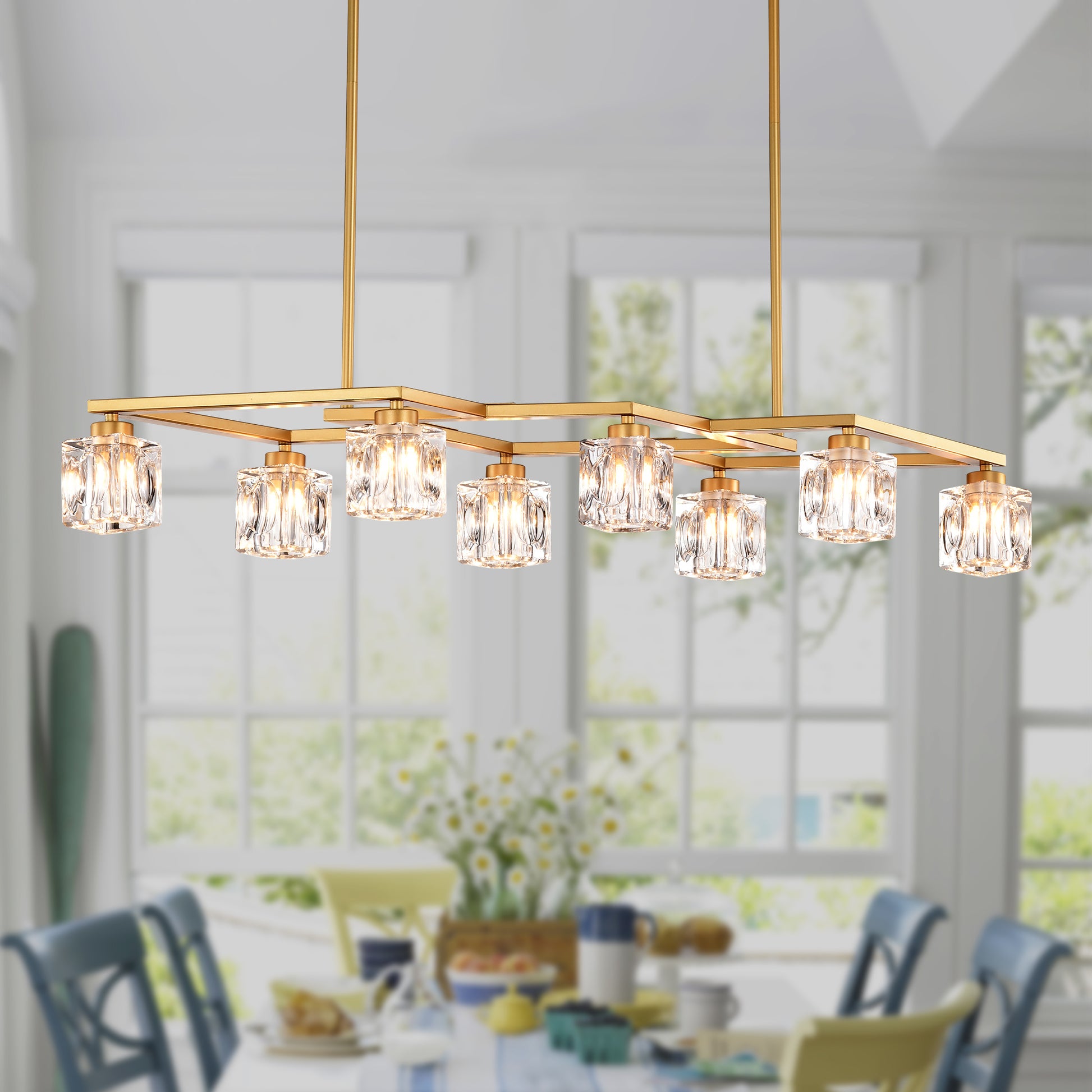 Gold linear chandelier with eight clear crystal shades