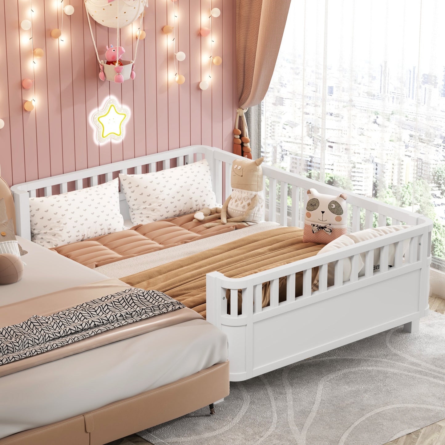 White convertible toddler bed with safety rails and plush bedding