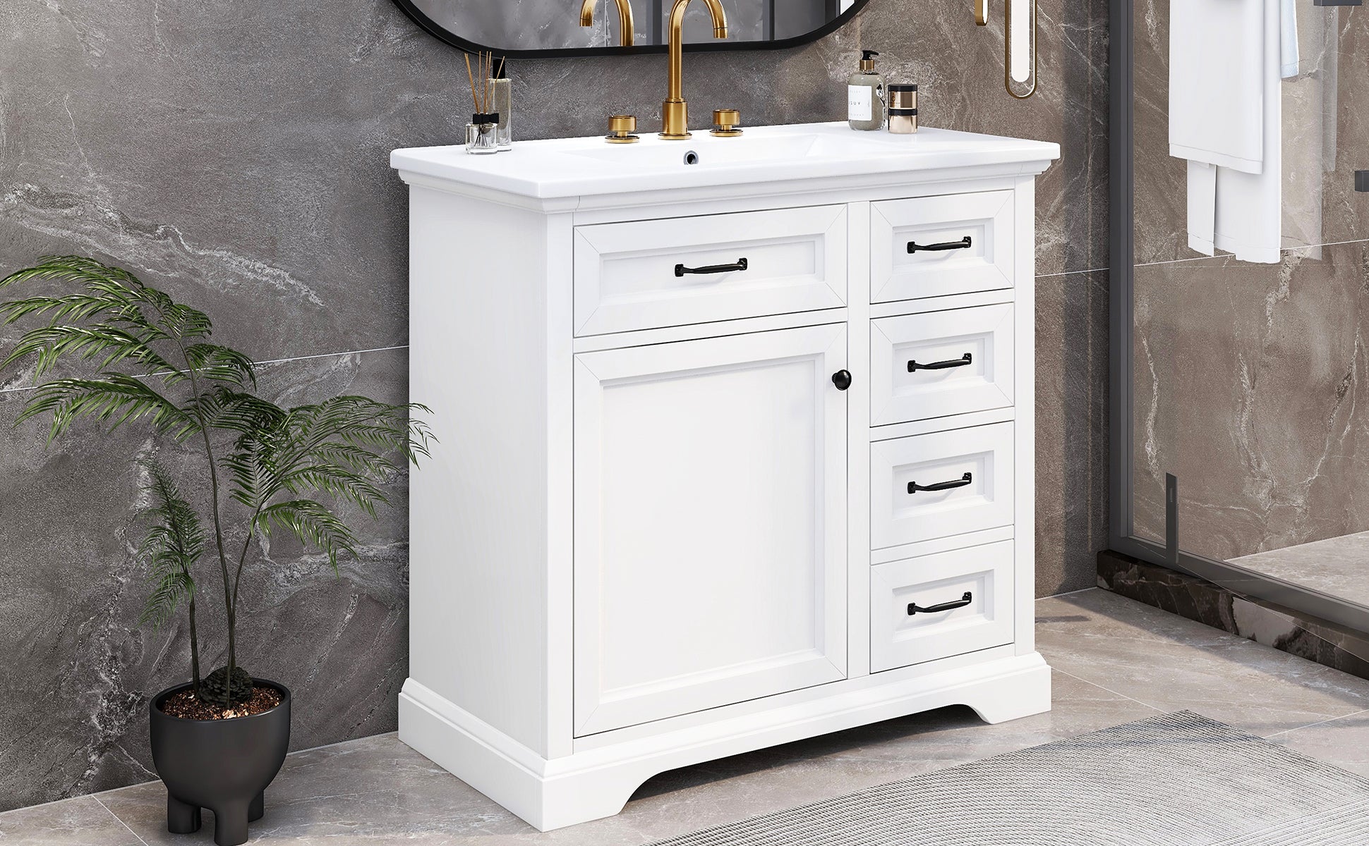 White shaker vanity with gold faucet and black hardware